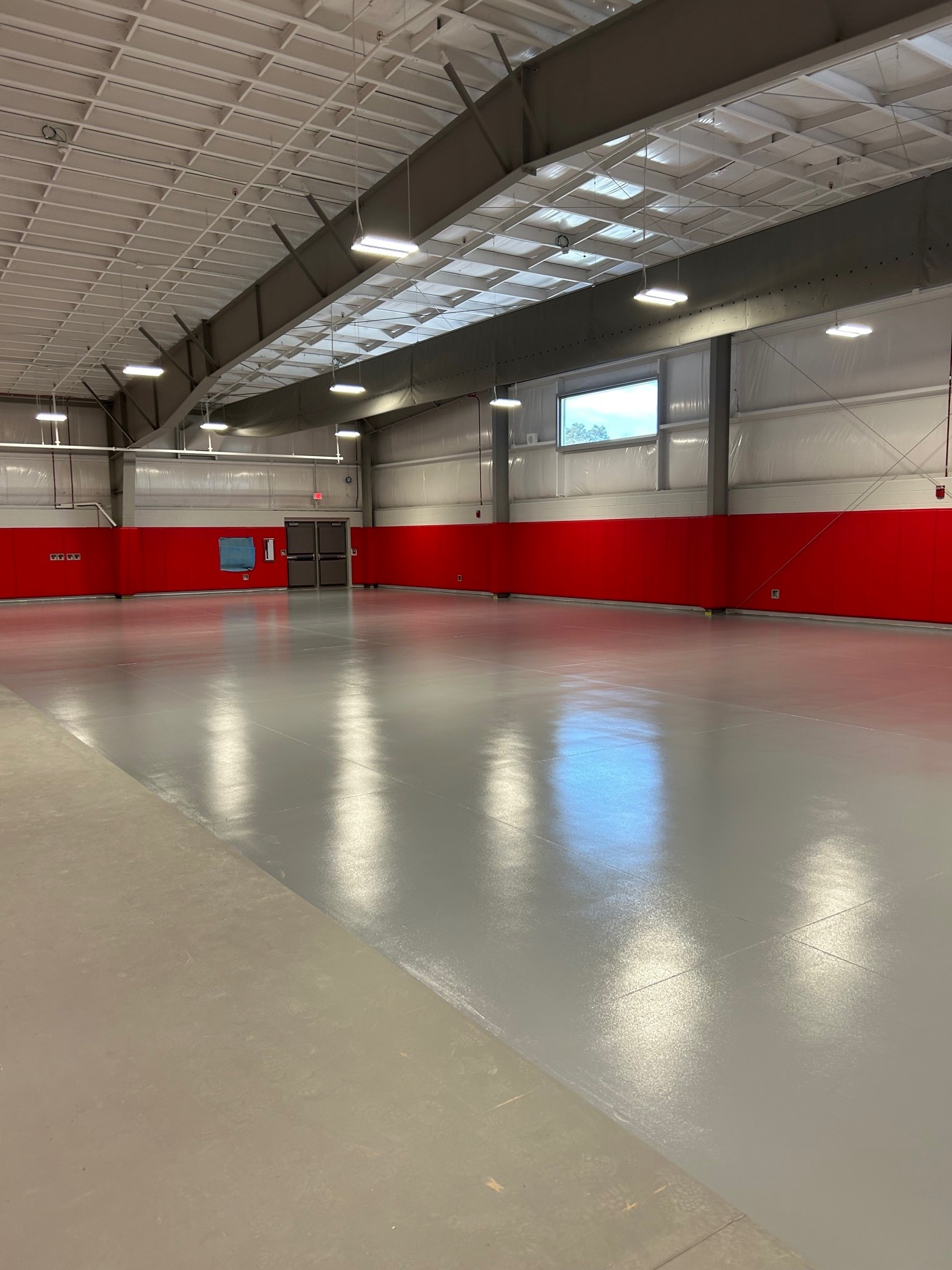 Wall padding install — Linden High School activity room