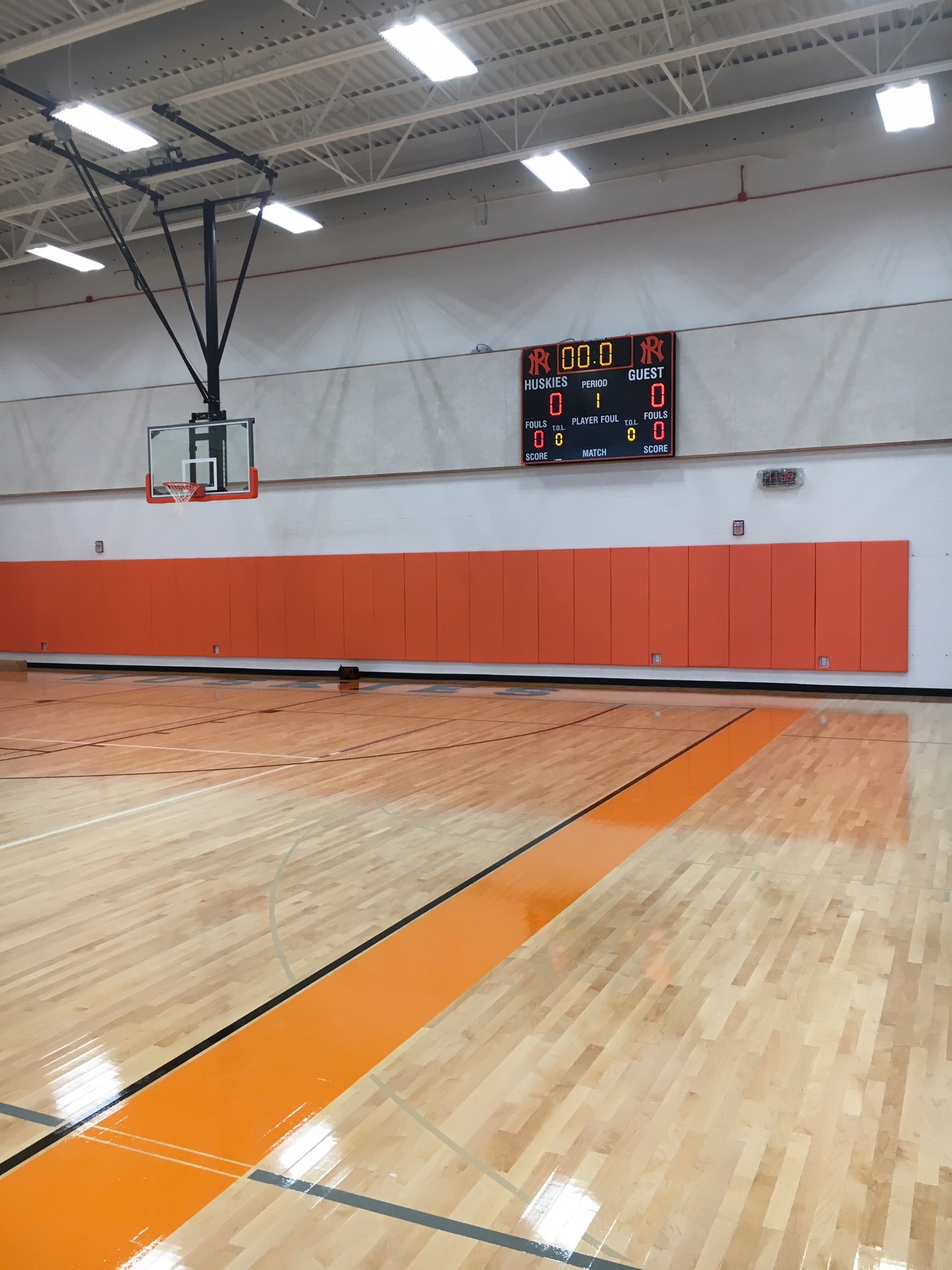 Ceiling-mounted basketball backstop — Portage North Middle School